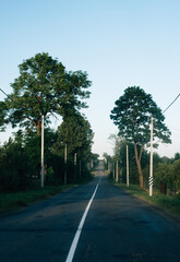 Asphalt road leading into the distance