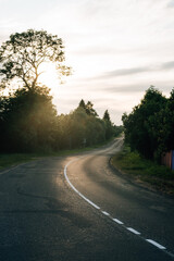 Asphalt road leading into the distance