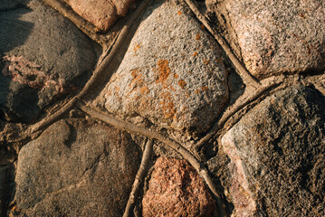 Old masonry wall made of large stones