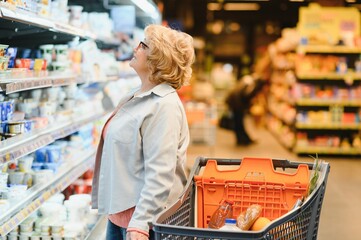 Image of senior woman in groceries department