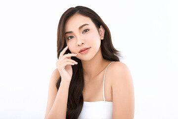 A beautiful young Asian woman with clean, fresh skin against a white background. Skincare, facial...