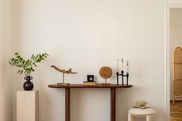 Stylish and minimalist composition on wooden design commode with copy space, flowers in vase,...