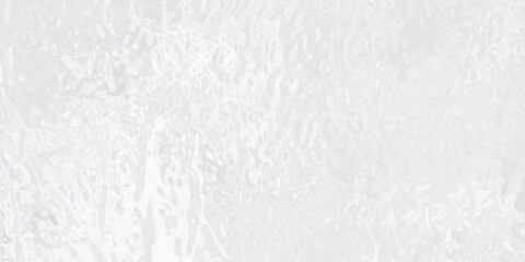 Serene watery surface of a frozen pond representing the beauty and quietude of winter time a smooth textured pale image