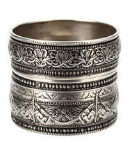 old silver bangles with engraved Lanna style on white background.