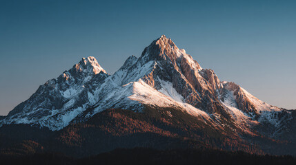 Majestic Peaks: A breathtaking view of rugged mountain peaks, their snow-capped summits kissed by the golden hour sunlight, framed by a serene blue sky.