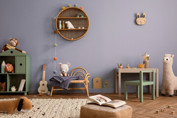 Cozy composition of kid room interior with round shelf, gray desk, green armchair, blue wall,...