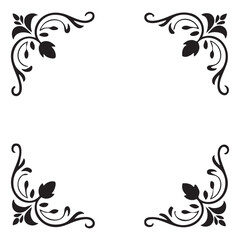 Fototapeta premium Elegant black floral corner ornament with swirling vines and leaves on a white background