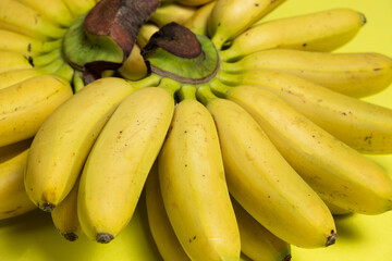 Bunch of mini baby bananas close-up