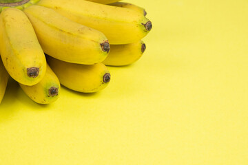 Bunch of mini baby bananas, copy space for text