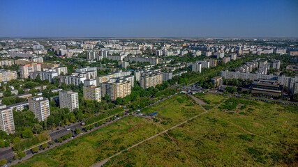 Obraz premium Soviet-era apartment blocks and green empty space on city outskirts