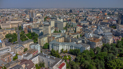 Aerial view of dense urban landscape with historic buildings.
