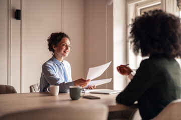 Professional Business Conversation in a Modern Office Environment