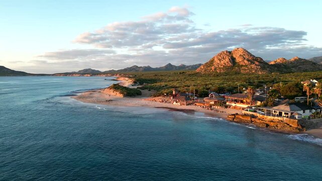 Ocean Lapping on Small Beach Town Shore