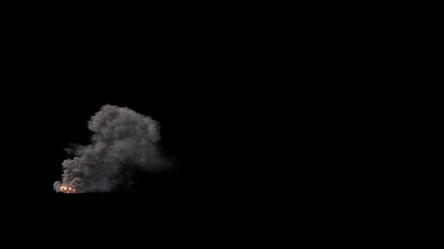 A concentrated fire burns on the ground, emitting a large, dense plume of black smoke that rises and billows. VFX element with alpha channel for crash sites, industrial fires, or disaster scenes.