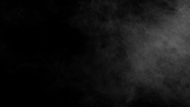 Thick white fog or smoke spreads slowly from the right across a black background. Ideal for atmospheric transitions overlays or moody scenes