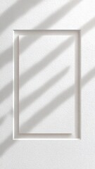 Minimal White Frame Casting Soft Shadows Against a Textured Surface in Contemporary Setting