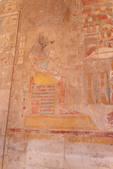 Ancient egyptian god anubis sitting on throne fresco painting luxor west bank egypt