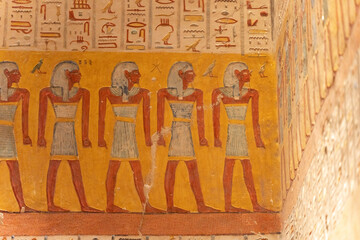 Ancient egyptian tomb painting showing pharaohs walking in procession