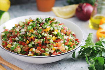 A bowl with traditional Israeli Salad