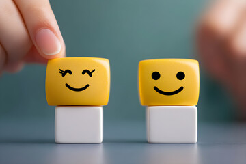 Positive Feedback and Customer Satisfaction Concept with Smiley Face Cube in Hand