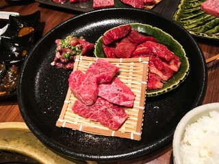 close up of Japanese raw uncooked wagyu beef ingredient on the plate ready for grilling ( yakiniku)