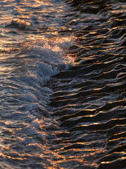 beautiful sea waves at sunset