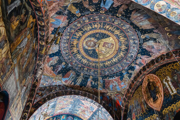 Intricate Byzantine Ceiling Frescoes with Christ Pantocrator at Bachkovo Monastery, Bulgaria, Depicting Heavenly Hosts and Biblical Scenes in a Richly Decorated Dome