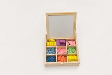 Wooden Box with Colorful Geometric Shapes for Educational Play,This Toy In China is called Tangram.
