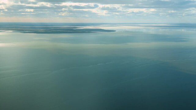 Witness the incredible natural phenomenon of Lake Eyre overflowing in the Australian Outback. This unique event occurs very rarely after enormous rains flooded huge areas of outback Queensland.