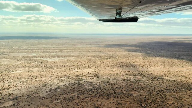 Experience a rare aerial perspective of the Desert near Lake Eyre in South Australia's vast outback.