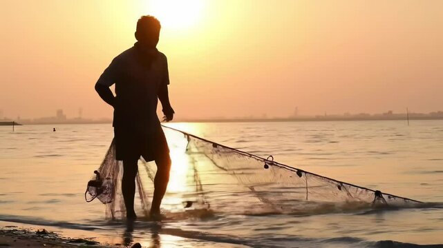 Fisherman casting net into water during sunset, silhouette against warm orange sky. Tranquil beach setting, serene waters reflecting light. Concept of fishing, outdoor sports, adventure
