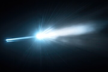 Bright light streaks across dark background