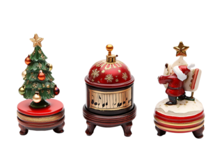 Three festive christmas figurines including a tree music box and santa isolated on transparent background
