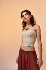Stylish young woman exudes summer elegance with a radiant smile and chic outfit