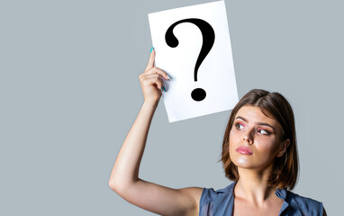 Woman with doubtful expression and question marks. Thinking woman. Getting answers, thinking. Girl...