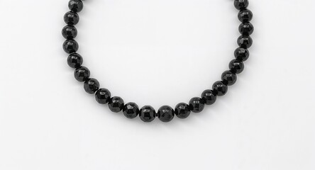 Obraz premium Different style black onyx choker design on plain white background