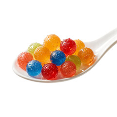 Assorted colorful popping boba balls on a white spoon against isolated transparent background, vibrant fruit bursting pearls