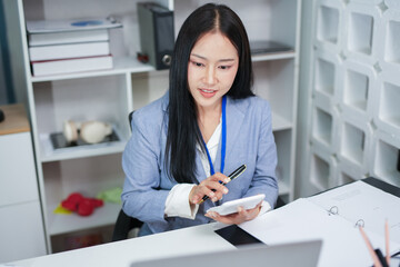 Accountant woman working on financial investment on calculator, calculation, business growth...