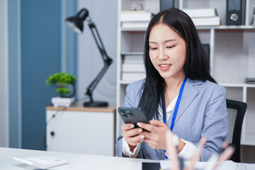 Accountant woman working on financial investment on calculator, calculation, business growth analysis and marketing on graph at office.