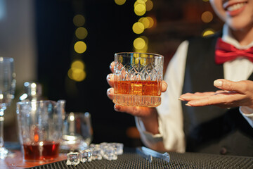 Bartender Serve Whiskey, on wood bar, 