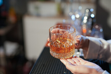 Bartender Serve Whiskey, on wood bar, 