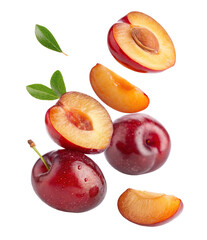 Fresh ripe plums and sweet cherries isolated with leaves for vibrant summer fruit composition