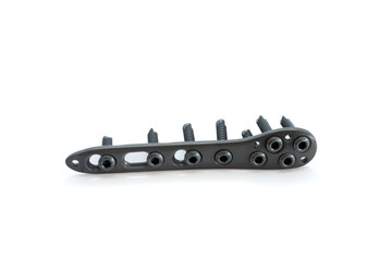 A Distal fibula Plate with screw isolated on the white background. Olecranon plate is used to fix a fractured a ankle bone joint.