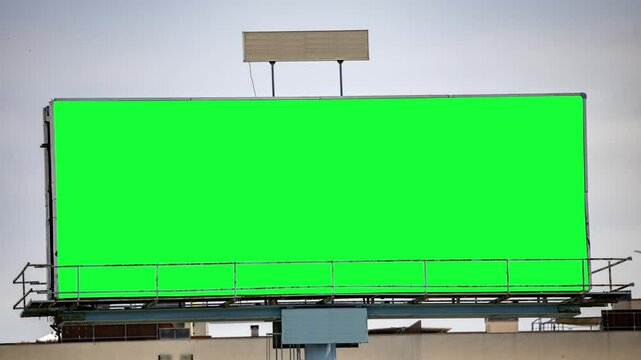 large outdoor advertising board with green screen
