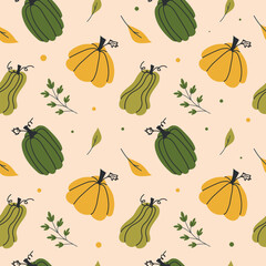 Seamless pattern of hand drawn green and yellow pumpkins with autumn leaves and botanical elements on a beige background