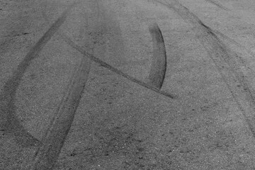 Abstract asphalt street road background with black tire marks on race track, Texture and background...
