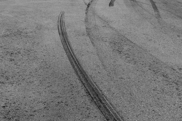 Abstract asphalt street road background with black tire marks on race track, Texture and background...