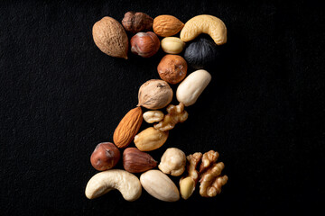 a number of nuts arranged in the shape of a letter z