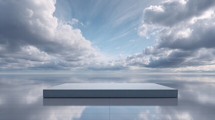 Empty gray platform on a reflective surface under a cloudy sky