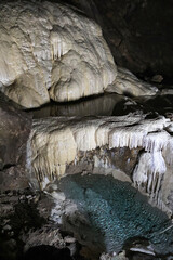 Stunning view of the New Athos stalactite cave in Abkhazia, Georgia. The limestone formations,...